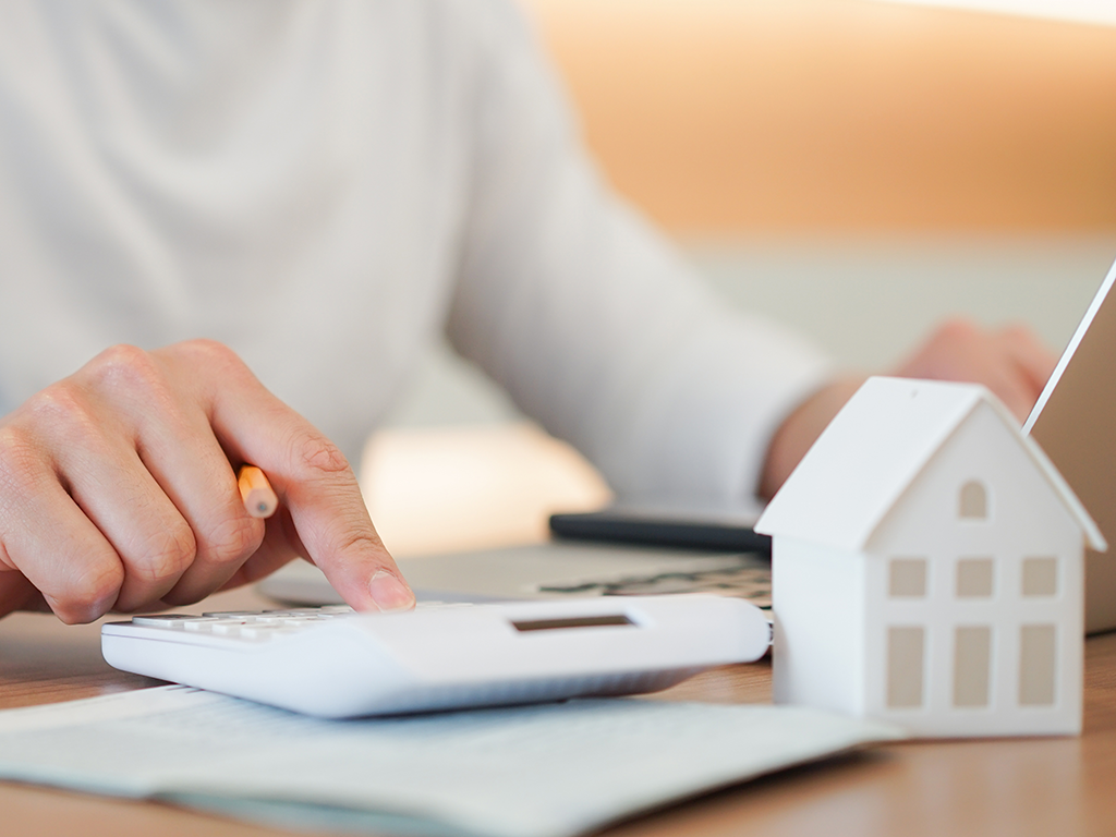 House and Calculator Image